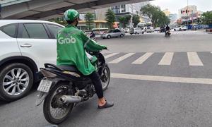 Grab "vẽ" thêm phụ thu nắng nóng, Bộ Công Thương yêu cầu giải trình