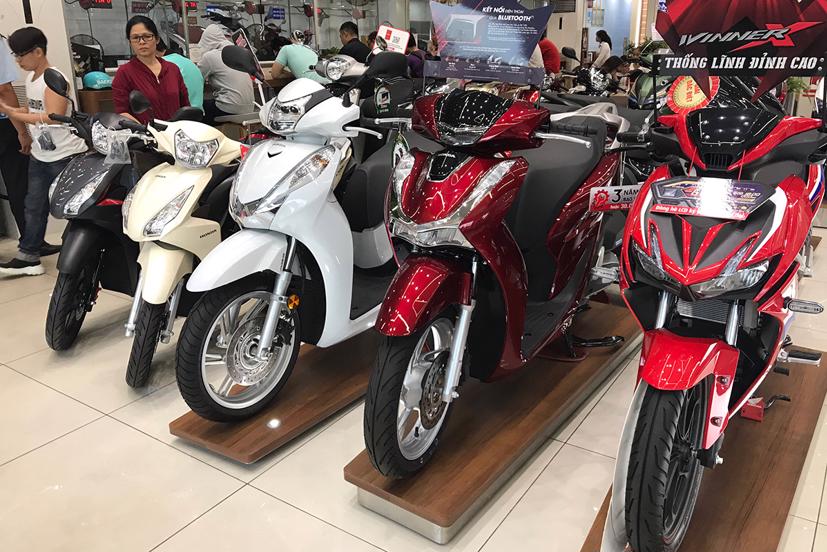 Cứ 7 người mua xe m&#225;y c&#243; một người mua &#244;t&#244; - Ảnh 1