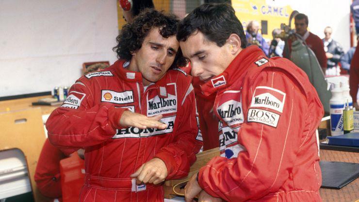 Nigel Marsell (phải) và Alain Prost.